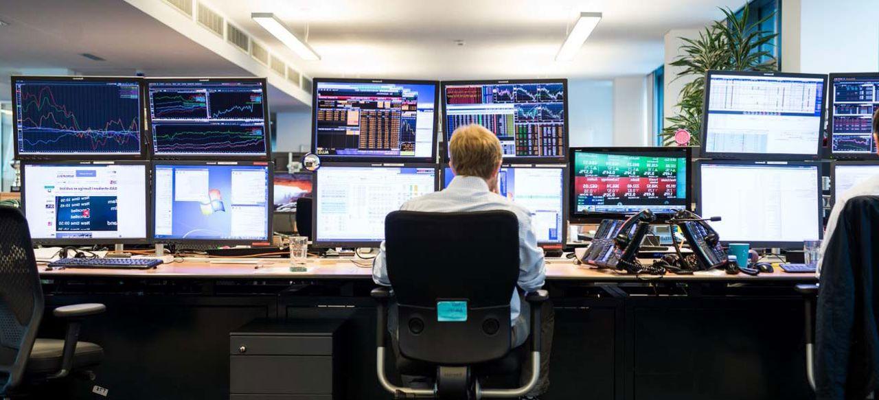 Man working with monitors